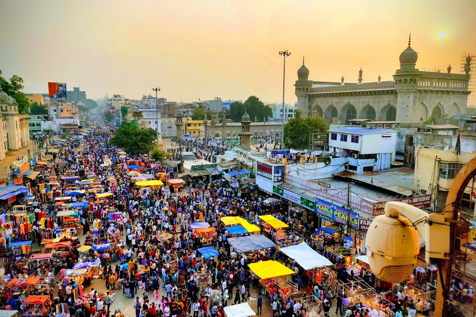 Laad Bazaar below the Charminar at sunset — the old city’s pearl and bangle market