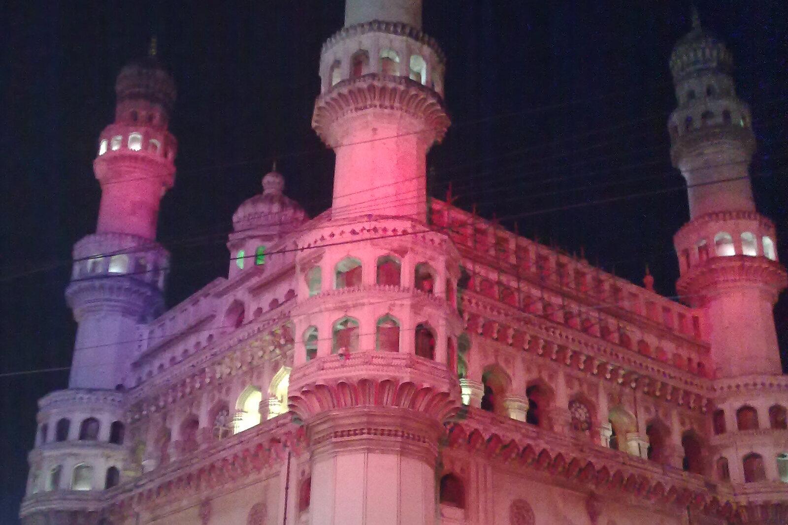 The Charminar floodlit after dark, the 16th-century landmark at the heart of Hyderabad